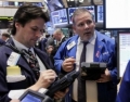 Milano chiude frenando,+0,43%,spread sotto 300 poi risale